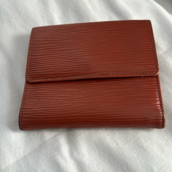 Louis Vuitton Authentic Rust Brown color compact wallet. 6 card & 1 bill slots. - Picture 1 of 12